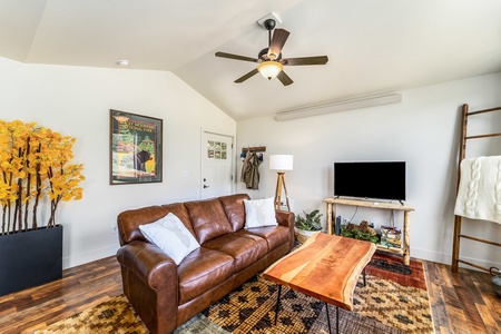 Living area with a sofa and flat screen TV