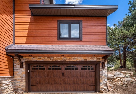 Guests enter through garage. Guests can park 1 car in garage.