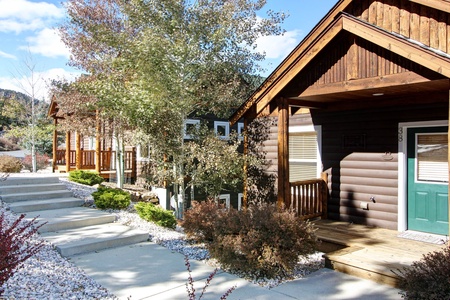 Single step up from the sidewalk and parking area into the condo.