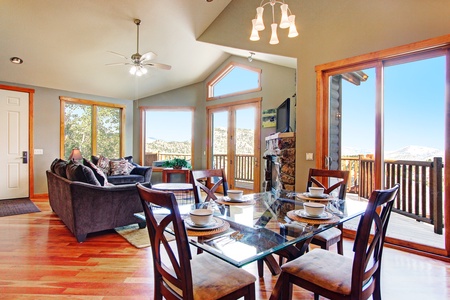 Dining set for 4 overlooks the living room and beautiful views out the floor to ceiling windows. 