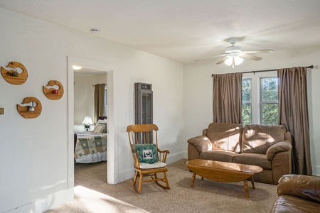 O'Deer Cabin Estes Park, Living room with a couch, loveseat and rocking chair.