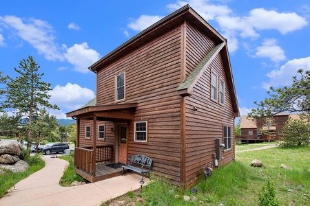 Exterior view of Marmot 1, with front door and small porch.