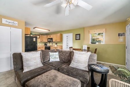 Lovesac sectional in the living room that easily transforms into an additional sleeping area