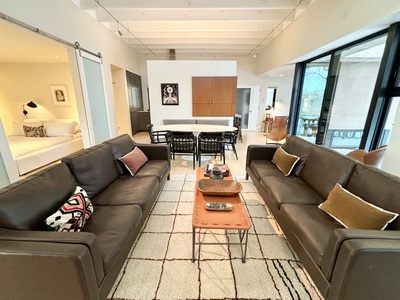 A living room with couches and a coffee table.