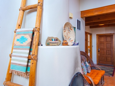 A wooden ladder in a living room.