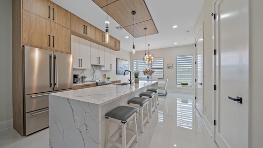 Large kitchen island with additional seating for 4