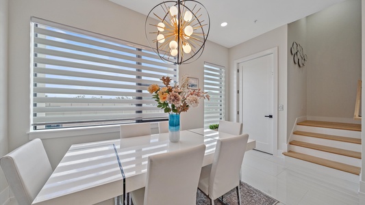 Large formal dining room table perfect for meals and gatherings