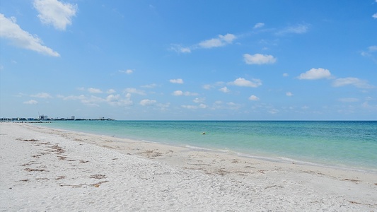 Direct access to South Lido Key Beach for morning runs and evening sunsets.
