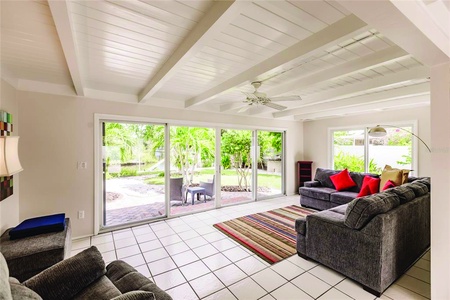 Living Room  Living Room  Spacious living room with views of the backyard and canal.