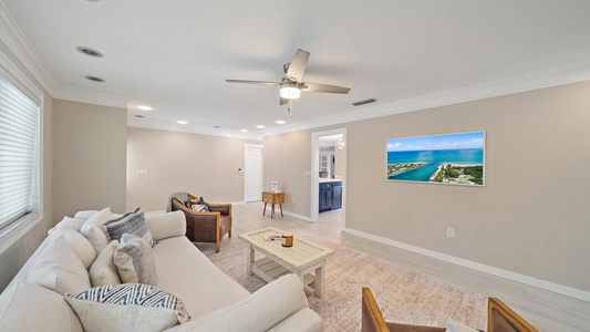 Cozy living area with Smart TV, perfect for family gatherings, movie night, or socializing after a day at the beach.