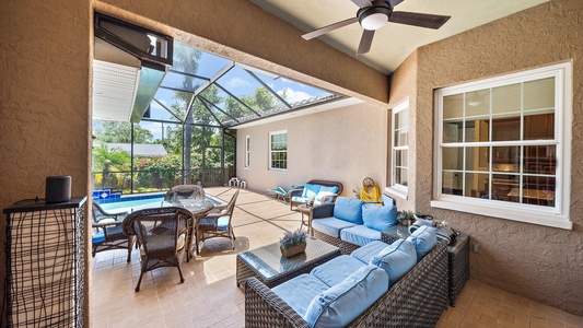 Shaded outdoor patio and seating area perfect for family gatherings after a day at Siesta Key beach