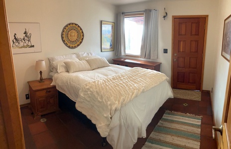Second Bed cozy queen and door to patio