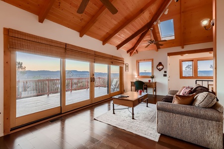 Living room with doors closed and patio view