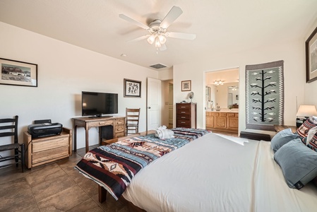 Master bedroom with King bed and office desk with wireless printer
