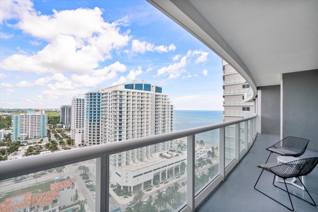 Outdoor large balcony with seating areas offering ocean and intracoastal views