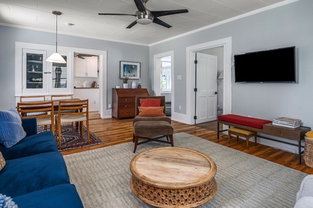 Brown chair, blue couch, kitchen table