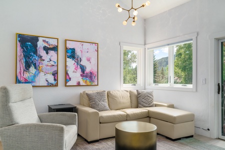 The modern decor carries throughout the condo.