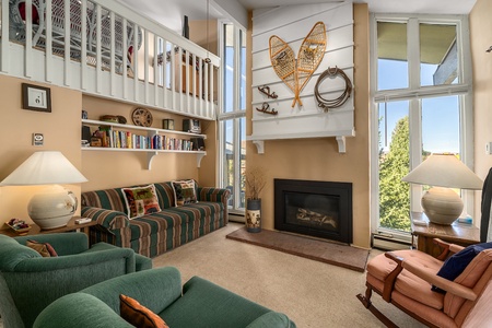 The high-ceilings and large windows of this property pour natural light throughout the condo.