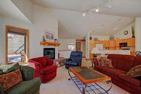 Living room features a queen sofa sleeper.