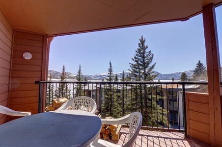 Covered balcony offers seating and great views of Lake Dillon