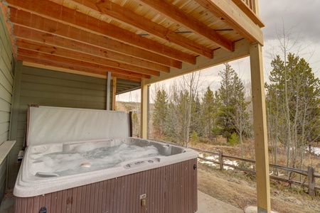 Hot tub looks out to a wooded view