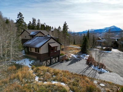 The home features a large private driveway and great views of Summit County Mountains.