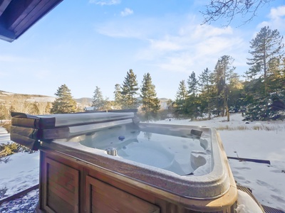 Private outdoor hot tub off of the lower level of the home.