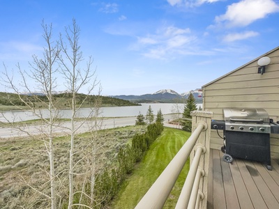 Beautiful balcony views of Lake Dillon. The deck features a grill.