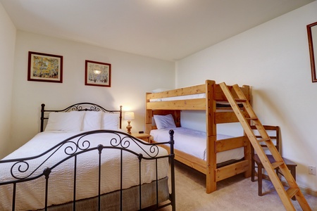 Lower level bedroom #1 featuring multiple sleeping options.