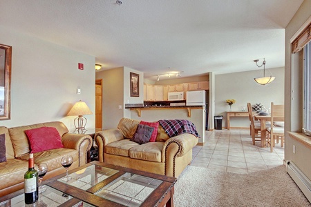 Open concept living and kitchen area, dining area on the right