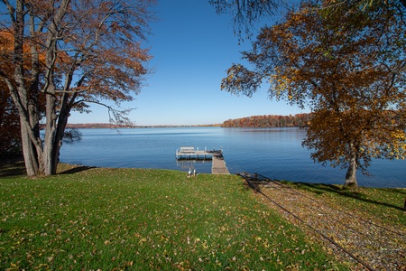 Backyard and private dock with boat ramp