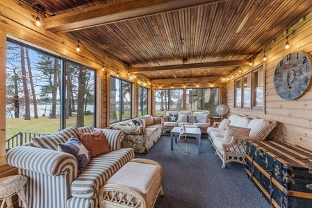 3 season porch with plenty of seating and room for games