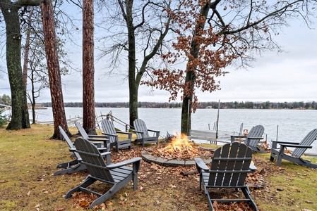 Enjoy cozy nights by the lake with a roaring fire