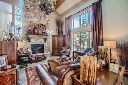 Rustic living room with stone fireplace