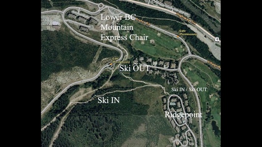 Aerial view showing a skiing route labeled "Ski IN" and "Ski OUT" with landmarks including Lower BC Mountain Express Chair, Ridgepoint, and nearby roads and gates.