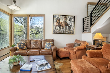 Living room with wooded views