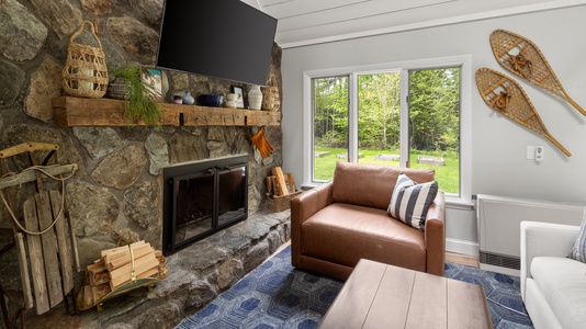 Open Living area with fireplace and tv for family fun time