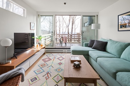 Cozen open Living Area and Kitchen with Gas Fireplace