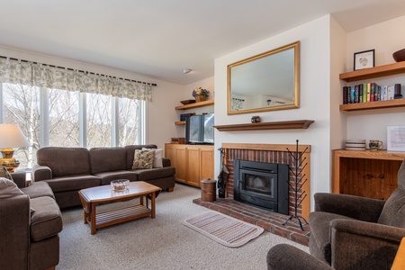Unwind by the crackling wood-burning fireplace after a day on the slopes