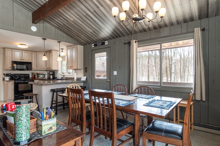 Spacious dining area with plenty of room and extra seating for everyone to gather and enjoy!