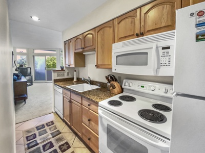 Galley Kitchen stocked with what you need for meals