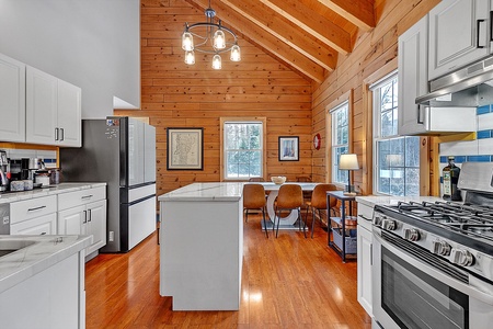 Bright, airy space with large windows that fill the room with natural light.