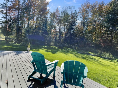 Spacious deck off living room, overlooking lush back yard