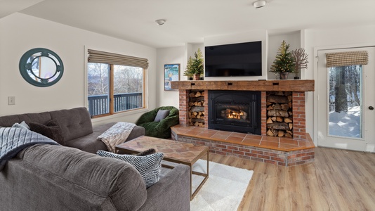 Relax by the fireplace after a fun day on the mountain