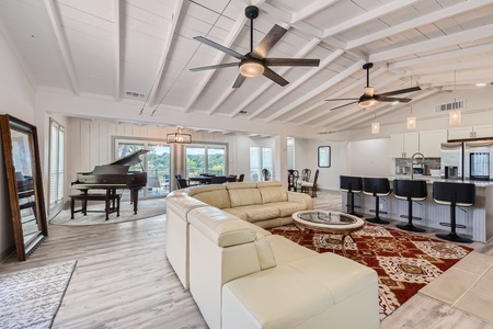 Large family room with baby grand piano