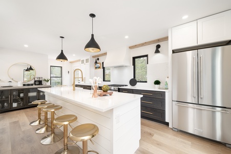 A modern kitchen with a spacious island, ready for all your cooking adventures.