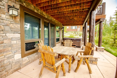 Lower level outdoor seating next to the private hot tub