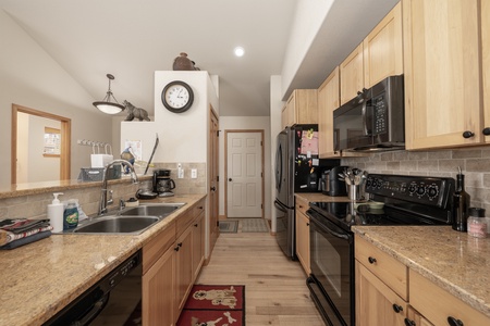 Fully stocked kitchen with room for all of the household chefs