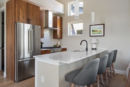 Enjoy a seated view of the chef and open kitchen