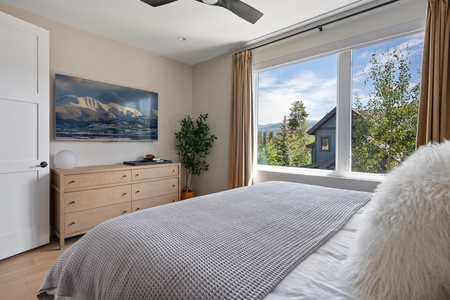Wind down in the upstairs bedroom equipped with a smart TV